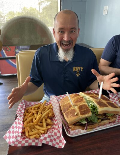 Foodie & Food Enthusiast eats Giant Bacon Cheeseburger and Fries